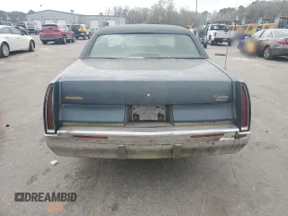 1996 Cadillac Fleetwood z VIN 1G6DW52P4TR704177, wystawiony jako Copart lot #49005355 z przebiegiem 145 635 mil mil oraz Czysty tytuł • Clean title. Historia ofert i sprzedaży dostępna na DreamBid. Obrazek 6.