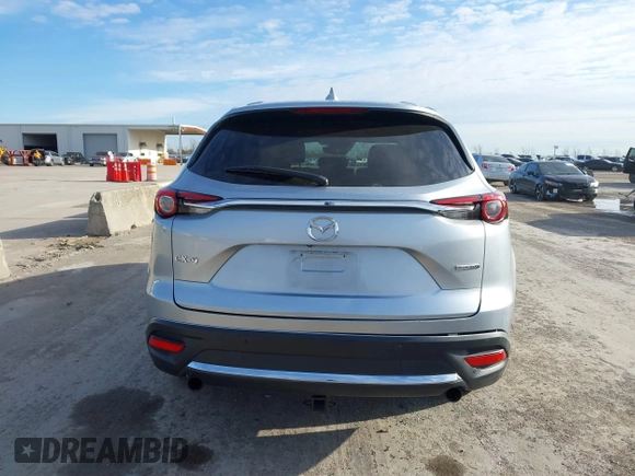 2020 Mazda CX-9 Grand Touring z VIN JM3TCADY7L0416696, wystawiony jako IAAI lot #41310183 z przebiegiem 105 754 mil mil oraz . Historia ofert i sprzedaży dostępna na DreamBid. Obrazek 16.