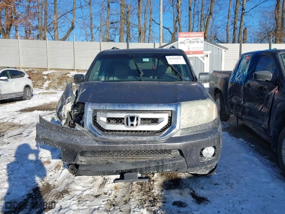 2011 Honda Pilot EX-L with VIN 5FNYF4H53BB009871, listed as a IAAI auction lot 41610433 with 203,671 mi miles. Bid and sale history available at carsss.com. Image 12.