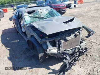 2019 Dodge Challenger R/T z VIN 2C3CDZBT8KH570991, wystawiony jako IAAI lot #42133680 z przebiegiem 158 186 mil mil oraz . Historia ofert i sprzedaży dostępna na DreamBid. Obrazek 6.