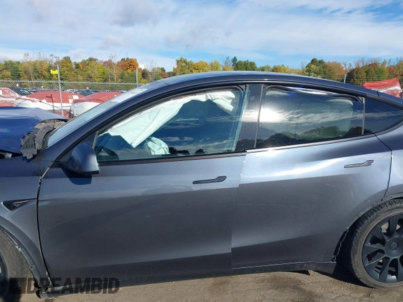 2020 Tesla Model Y Long Range with VIN 5YJYGDEE0LF041762, listed as a IAAI auction lot 40556913 with Not Provided miles and . Bid and sale history available at DreamBid. Image 15.