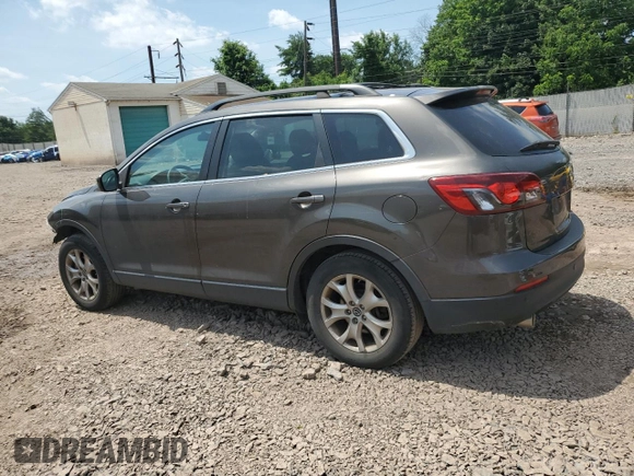 2015 Mazda CX-9 Touring with VIN JM3TB3CV3F0455294, listed as a Copart auction lot 62056495 with Not provided miles and Salvage title. Bid and sale history available at DreamBid. Image 2.