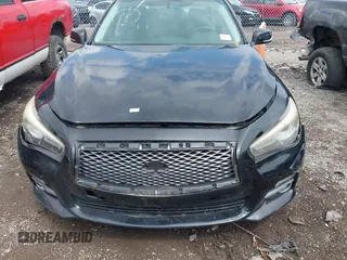 2014 Infiniti Q50 Premium z VIN JN1BV7AR4EM695666, wystawiony jako IAAI lot #42437594 z przebiegiem 141 008 mil mil oraz . Historia ofert i sprzedaży dostępna na DreamBid. Obrazek 13.