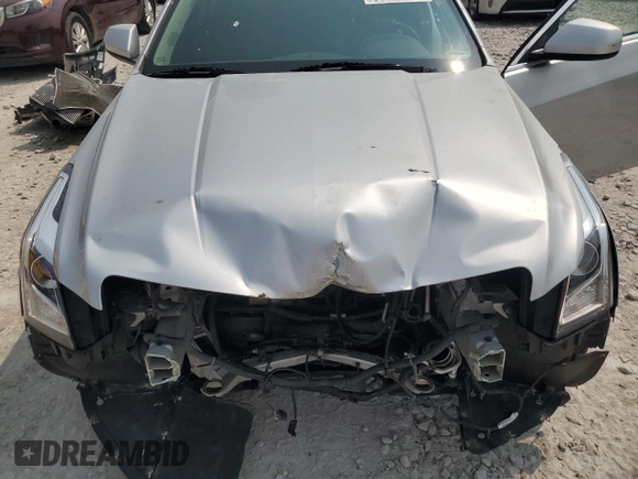 2013 Cadillac ATS z VIN 1G6AG5RXXD0125335, wystawiony jako Copart lot #59125695 z przebiegiem Nie podano mil oraz Czysty tytuł • Clean title. Historia ofert i sprzedaży dostępna na DreamBid. Obrazek 11.