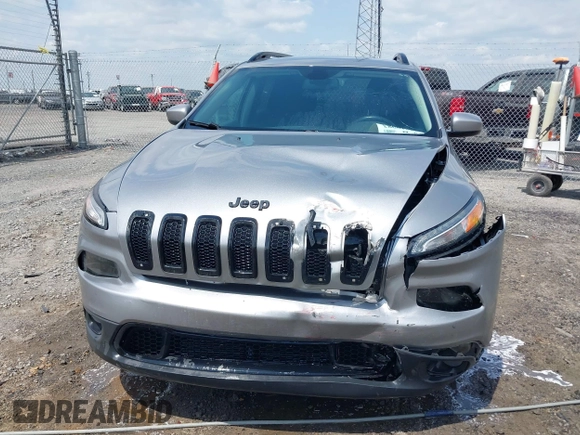 2016 Jeep Cherokee Latitude with VIN 1C4PJLCB3GW176901, listed as a IAAI auction lot 42019983 with 141,104 mi miles and . Bid and sale history available at DreamBid. Image 12.