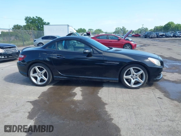 2013 Mercedes-Benz SLK 250 z VIN WDDPK4HA5DF059891, wystawiony jako IAAI lot #42015777 z przebiegiem 79 255 mil mil oraz . Historia ofert i sprzedaży dostępna na DreamBid. Obrazek 13.