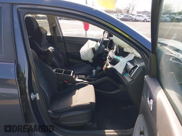 2019 Hyundai Tucson SE with VIN KM8J23A4XKU932814, listed as a IAAI auction lot 40968319 with 107,365 mi miles. Bid and sale history available at carsss.com. Image 5.