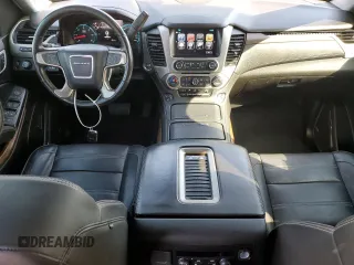 2019 GMC Yukon XL Denali with VIN 1GKS2HKJ9KR264134, listed as a Copart auction lot 43138545 with 105,690 mi miles and Salvage Title. Bid and sale history available at DreamBid. Image 8.