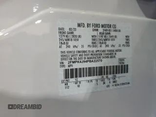 2023 Ford Edge SEL z VIN 2FMPK4J94PBA22570, wystawiony jako Copart lot #56350435 z przebiegiem 27 761 mil mil oraz Szkoda całkowita • Salvage title. Historia ofert i sprzedaży dostępna na DreamBid. Obrazek 13.