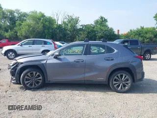 2021 Lexus UX 250h F Sport z VIN JTHE9JBHXM2045377, wystawiony jako IAAI lot #42580566 z przebiegiem 52 838 mil mil oraz . Historia ofert i sprzedaży dostępna na DreamBid. Obrazek 15.