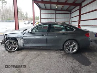 2018 BMW 4 Series 430i xDrive with VIN WBA4J3C57JBG95638, listed as a IAAI auction lot 41960833 with 108,504 mi miles and . Bid and sale history available at DreamBid. Image 14.