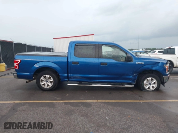 2018 Ford F-150 XL with VIN 1FTEW1CB2JFC79764, listed as a IAAI auction lot 42378319 with 69,571 mi miles and . Bid and sale history available at DreamBid. Image 13.