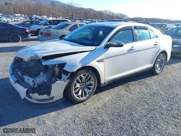 2013 Ford Taurus Limited with VIN 1FAHP2F82DG131585, listed as a IAAI auction lot 41076163 with 134,916 mi miles. Bid and sale history available at carsss.com. Image 2.