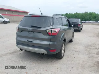 2017 Ford Escape SE с VIN 1FMCU9GD3HUD71233, выставлен на аукционе IAAI как лот 42449711 с пробегом 107 666 миль миль и . История ставок и продаж доступна на DreamBid. Изображение 4.