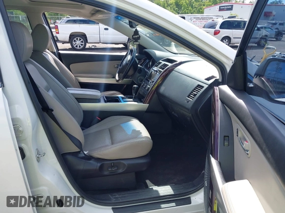 2014 Mazda CX-9 Grand Touring with VIN JM3TB2DA8E0436650, listed as a IAAI auction lot 42147525 with 124,179 mi miles and . Bid and sale history available at DreamBid. Image 5.