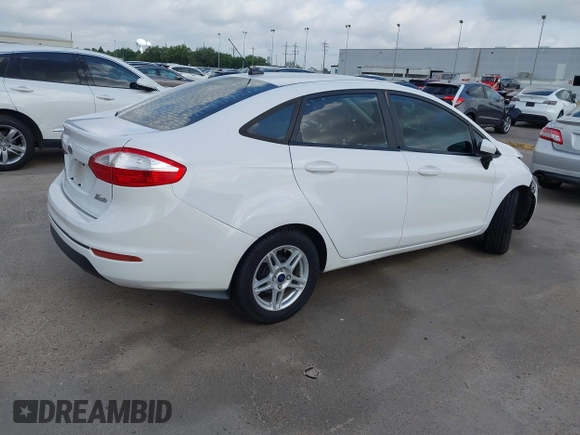 2017 Ford Fiesta SE z VIN 3FADP4BJ1HM126375, wystawiony jako IAAI lot #42244318 z przebiegiem 70 829 mil mil oraz . Historia ofert i sprzedaży dostępna na DreamBid. Obrazek 4.