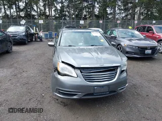 2011 Chrysler 200 Touring with VIN 1C3BC1FG2BN603732, listed as a IAAI auction lot 41938310 with 131,361 mi miles. Bid and sale history available at carsss.com. Image 12.