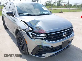 2023 Volkswagen Tiguan SE R-Line Black с VIN 3VVCB7AX5PM064412, выставлен на аукционе IAAI как лот 42279912 с пробегом 72 528 миль миль и . История ставок и продаж доступна на DreamBid. Изображение 6.