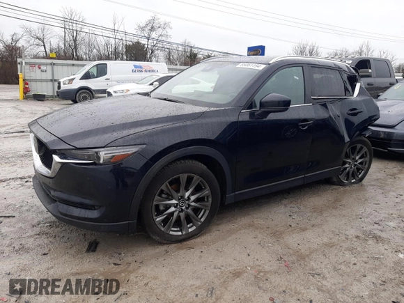 2021 Mazda CX-5 Signature with VIN JM3KFBEY8M0436075, listed as a Copart auction lot 85061194 with 66,471 mi miles and Salvage Title. Bid and sale history available at carsss.com. Image 1.