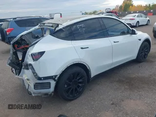 2021 Tesla Model Y Long Range with VIN 5YJYGDEE2MF074246, listed as a IAAI auction lot 40456971 with 94,527 mi miles. Bid and sale history available at carsss.com. Image 4.