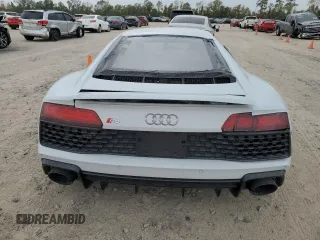 2022 Audi R8 performance quattro z VIN WUACEAFX2N7900201, wystawiony jako Copart lot #82878454 z przebiegiem 4 248 mil mil oraz Czysty tytuł • Clean title. Historia ofert i sprzedaży dostępna na DreamBid. Obrazek 6.