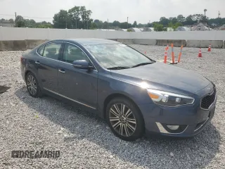 2014 Kia Cadenza Premium z VIN KNALN4D70E5167401, wystawiony jako Copart lot #59879075 z przebiegiem 130 894 mil mil oraz Czysty tytuł • Clean title. Historia ofert i sprzedaży dostępna na DreamBid. Obrazek 4.