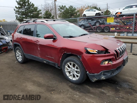 2014 Jeep Cherokee Altitude with VIN 1C4PJMCSXEW124863, listed as a Copart auction lot 82432534 with 194,559 mi miles and Salvage Title. Bid and sale history available at carsss.com. Image 4.
