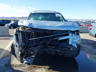 2013 Chevrolet Tahoe LT with VIN 1GNSKBE01DR157083, listed as a IAAI auction lot 41759189 with 153,403 mi miles and . Bid and sale history available at DreamBid. Image 13.
