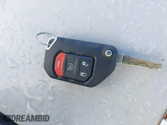 2022 Jeep Gladiator Willys z VIN 1C6JJTAM4NL130350, wystawiony jako IAAI lot #41964484 z przebiegiem Nie podano mil oraz . Historia ofert i sprzedaży dostępna na DreamBid. Obrazek 11.