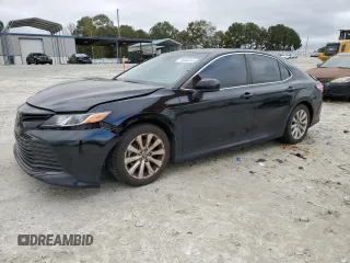 2020 Toyota Camry LE with VIN 4T1C11AK2LU968738, listed as a Copart auction lot 79946614 with 95,799 mi miles and Salvage Title. Bid and sale history available at carsss.com. Image 1.