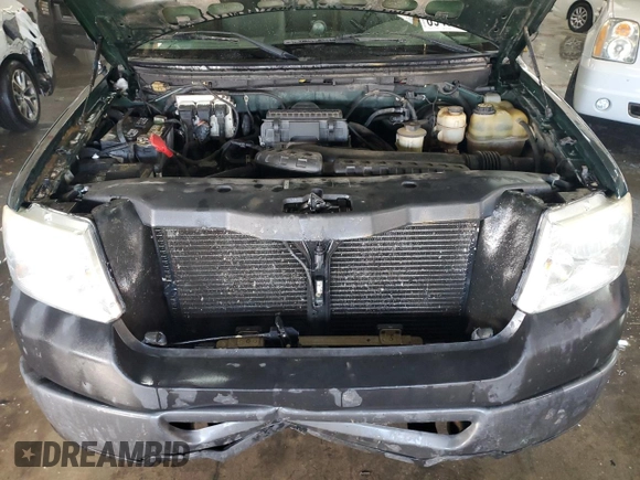 2007 Ford F-150 XL with VIN 1FTRF14VX7KB40654, listed as a Copart auction lot 89401715 with 156,196 mi miles and Clean title. Bid and sale history available at DreamBid. Image 11.