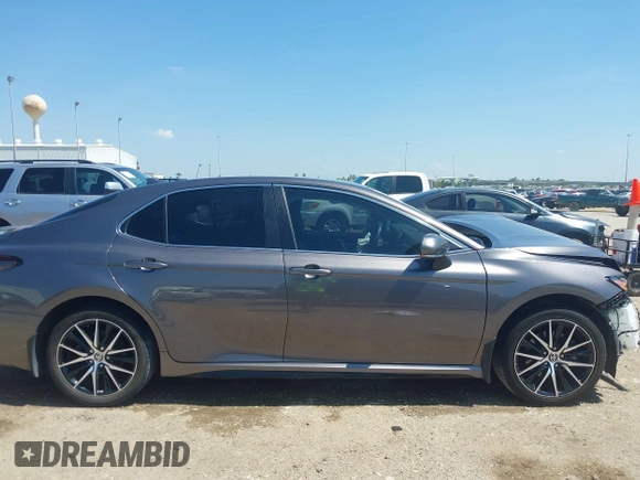 2023 Toyota Camry SE z VIN 4T1G11AK3PU735202, wystawiony jako IAAI lot #41874542 z przebiegiem 54 708 mil mil oraz . Historia ofert i sprzedaży dostępna na DreamBid. Obrazek 14.