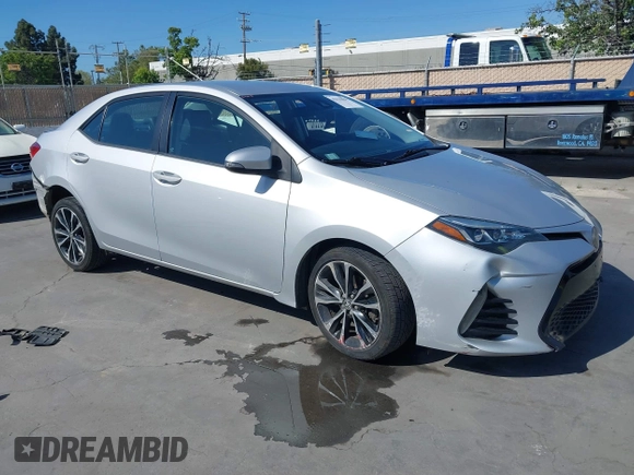 2017 Toyota Corolla L z VIN 5YFBURHE6HP652091, wystawiony jako IAAI lot #42131898 z przebiegiem 380 284 mil mil oraz . Historia ofert i sprzedaży dostępna na DreamBid. Obrazek 1.