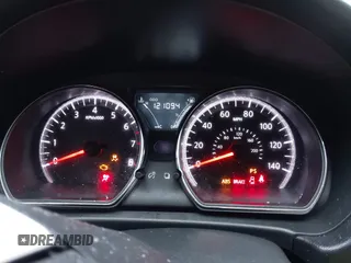 2016 Nissan Versa SV z VIN 3N1CN7APXGL879574, wystawiony jako IAAI lot #41510622 z przebiegiem 121 094 mil mil oraz . Historia ofert i sprzedaży dostępna na DreamBid. Obrazek 7.