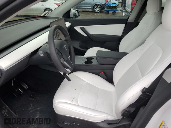2022 Tesla Model Y Long Range with VIN 7SAYGDEE2NF403385, listed as a Copart auction lot 48594095 with 39,443 mi miles and Salvage Title. Bid and sale history available at DreamBid. Image 7.