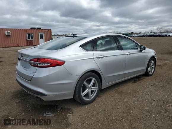 2018 Ford Fusion SE с VIN 3FA6P0HDXJR130582, выставлен на аукционе Copart как лот 53169815 с пробегом 137 512 миль миль и Списание • Salvage title. История ставок и продаж доступна на DreamBid. Изображение 3.