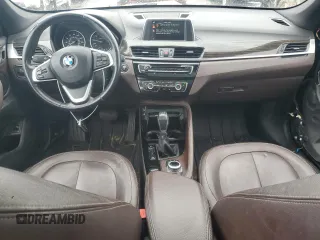 2016 BMW X1 xDrive28i with VIN WBXHT3Z30G4A49460, listed as a Copart auction lot 48998755 with 117,525 mi miles and Salvage Title. Bid and sale history available at carsss.com. Image 8.