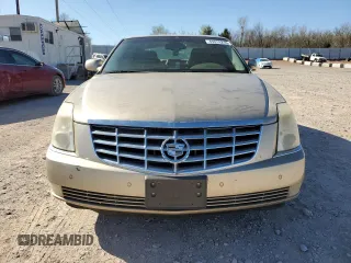 2006 Cadillac DTS 1SB z VIN 1G6KD57Y66U101604, wystawiony jako Copart lot #49918215 z przebiegiem 192 825 mil mil oraz Czysty tytuł • Clean title. Historia ofert i sprzedaży dostępna na DreamBid. Obrazek 5.