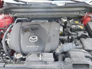 2021 Mazda CX-5 Grand Touring with VIN JM3KFBDM3M0434569, listed as a IAAI auction lot 42422349 with 25,924 mi miles and . Bid and sale history available at DreamBid. Image 10.