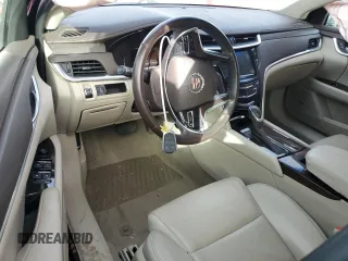 2014 Cadillac XTS z VIN 2G61L5S39E9300636, wystawiony jako Copart lot #78068634 z przebiegiem 117 549 mil mil oraz Szkody całkowita. Historia ofert i sprzedaży dostępna na DreamBid. Obrazek 8.