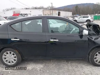 2019 Nissan Versa SV z VIN 3N1CN7APXKL817066, wystawiony jako IAAI lot #41387531 z przebiegiem 57 197 mil mil oraz . Historia ofert i sprzedaży dostępna na DreamBid. Obrazek 13.