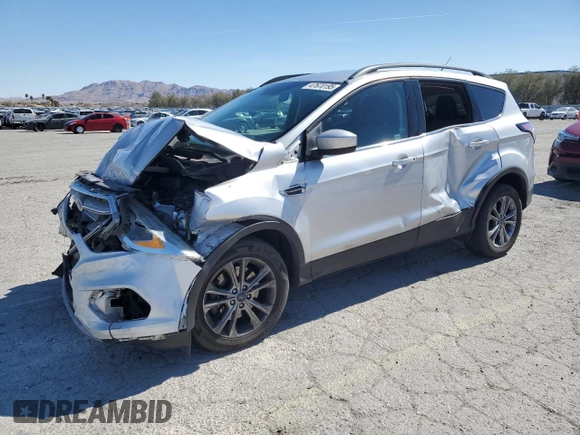 2017 Ford Escape SE with VIN 1FMCU9G90HUA39911, listed as a Copart auction lot 47670195 with 124,269 mi miles and Salvage Title. Bid and sale history available at carsss.com. Image 1.