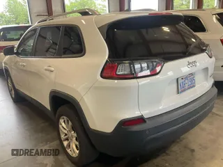 2020 Jeep Cherokee Latitude z VIN 1C4PJLCB4LD628070, wystawiony jako IAAI lot #42859811 z przebiegiem 119 307 mil mil oraz . Historia ofert i sprzedaży dostępna na DreamBid. Obrazek 2.