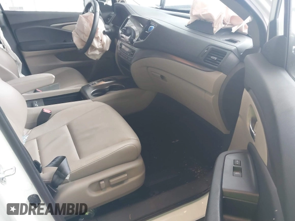 2022 Honda Pilot EX-L with VIN 5FNYF6H58NB097283, listed as a IAAI auction lot 40944566 with 22,027 mi miles and . Bid and sale history available at DreamBid. Image 5.