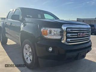 2018 GMC Canyon 4WD SLE z VIN 1GTG6CEN3J1328723, wystawiony jako Copart lot #55534775 z przebiegiem 92 295 mil mil oraz Czysty tytuł • Clean title. Historia ofert i sprzedaży dostępna na DreamBid. Obrazek 1.