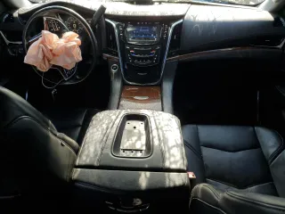 2015 Cadillac Escalade Luxury z VIN 1GYS4MKJ4FR596383, wystawiony jako Copart lot #53276405 z przebiegiem 124 493 mil mil oraz Szkoda całkowita • Salvage title. Historia ofert i sprzedaży dostępna na DreamBid. Obrazek 8.