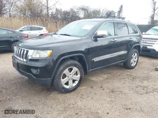 2013 Jeep Grand Cherokee Limited with VIN 1C4RJFBG0DC656382, listed as a IAAI auction lot 41870162 with 162,869 mi miles. Bid and sale history available at carsss.com. Image 17.