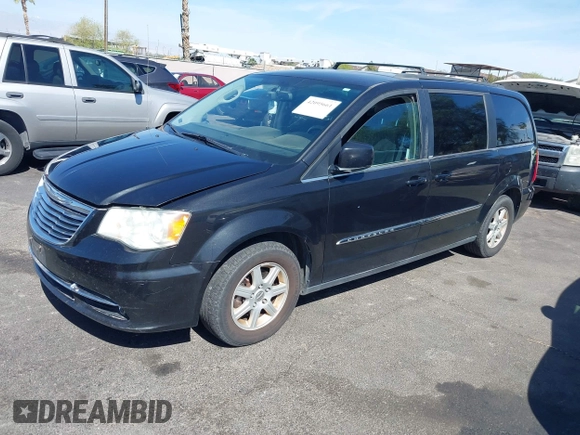 2011 Chrysler Town & Country Touring with VIN 2A4RR5DG2BR702731, listed as a IAAI auction lot 42095661 with 202,968 mi miles and . Bid and sale history available at DreamBid. Image 2.