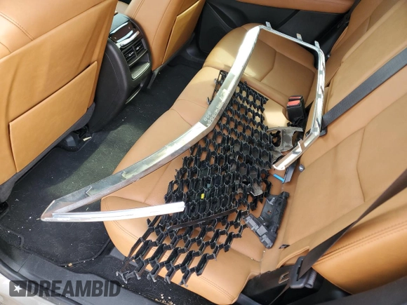 2022 Cadillac XT5 FWD Premium Luxury z VIN 1GYKNCRS9NZ180043, wystawiony jako Copart lot #51352195 z przebiegiem 12 399 mil mil oraz Szkoda całkowita • Salvage title. Historia ofert i sprzedaży dostępna na DreamBid. Obrazek 13.