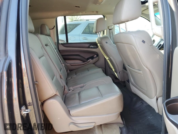 2015 Chevrolet Suburban LT z VIN 1GNSKJKC2FR508045, wystawiony jako Copart lot #56676985 z przebiegiem 120 436 mil mil oraz Szkoda całkowita • Salvage title. Historia ofert i sprzedaży dostępna na DreamBid. Obrazek 11.